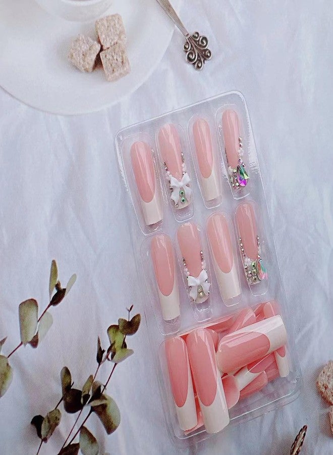 BSBTBZ 24pcs Long Press on Nails Coffin Nails Shiny with Charms French luxury Fake Nails Bow Flower Designs Cute Press ons Rhinestone Nails White French False Nail Tip Artificial Nails Finger Manicure - Image 5